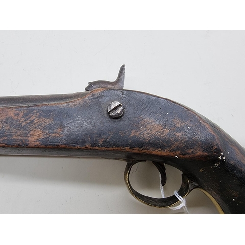 1551 - An antique percussion pistol, with12.5cm barrel, the grip stamped 745.