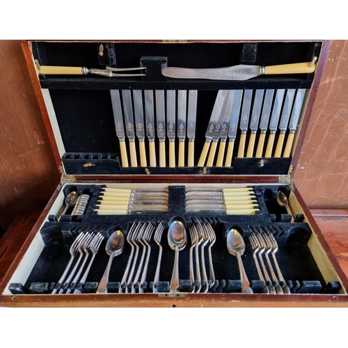 1565 - A collection of electroplated cutlery, to include: two incomplete canteens.