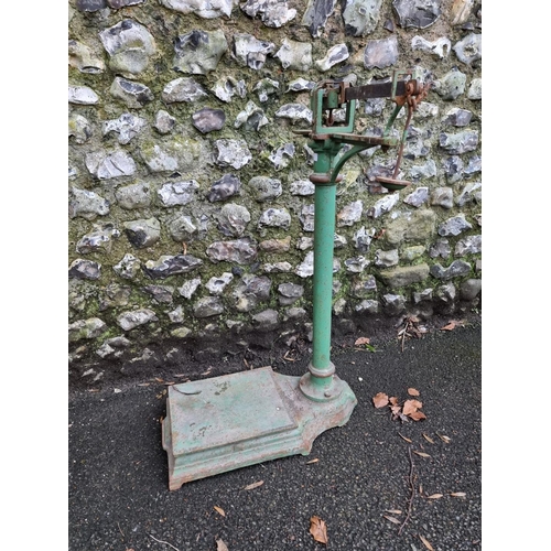 1569 - A set of vintage green painted weighing scales. 