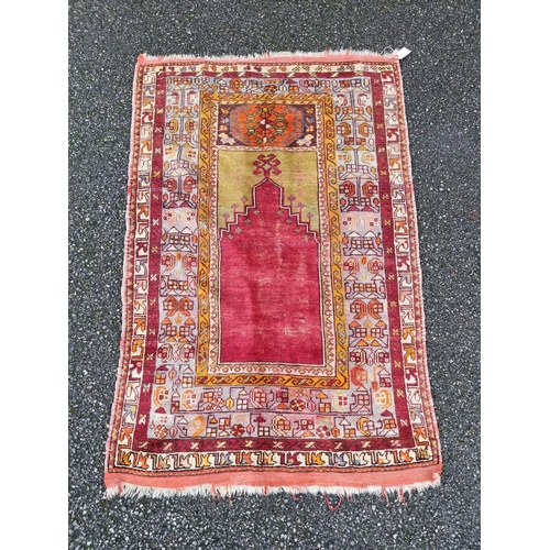 1576 - A Persian prayer rug, having temple design, with geometric borders, 150 x 100cm.