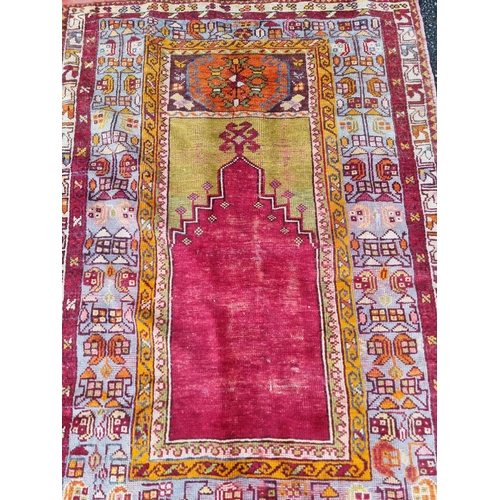 1576 - A Persian prayer rug, having temple design, with geometric borders, 150 x 100cm.