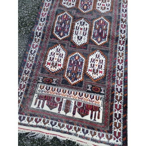 1578 - A tribal rug, having temple and allover geometric design, 147 x 79cm; together with a small prayer m... 