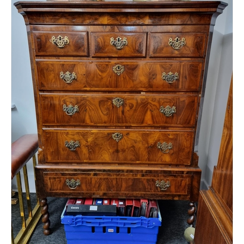 1100 - An 18th century walnut and featherbanded chest of drawers, on associated stand, 105.5cm wide, (the s... 