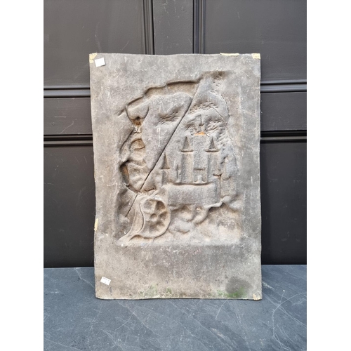 1200A - A lead relief plaque of a medieval knight and castle, 59.5 x 41cm. 