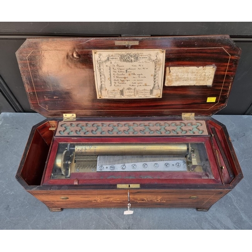 1556 - A late 19th century Swiss rosewood and inlaid music box with organ section, with 14in cylinder, play... 