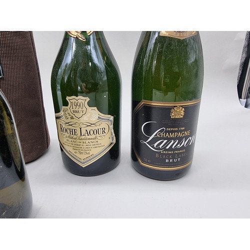 110A - Seven 75cl bottles of Champagne and sparkling wine, to include some vintage example. (7)... 