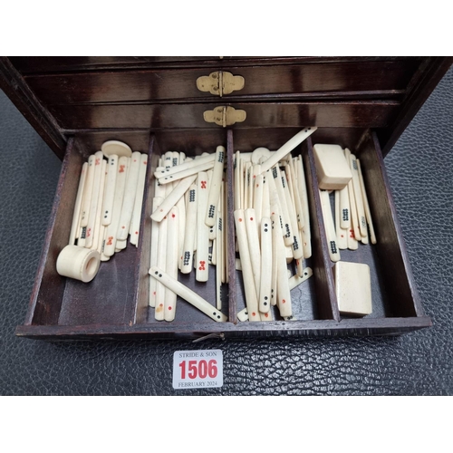 1303 - A cased bone and bamboo Mahjong set.