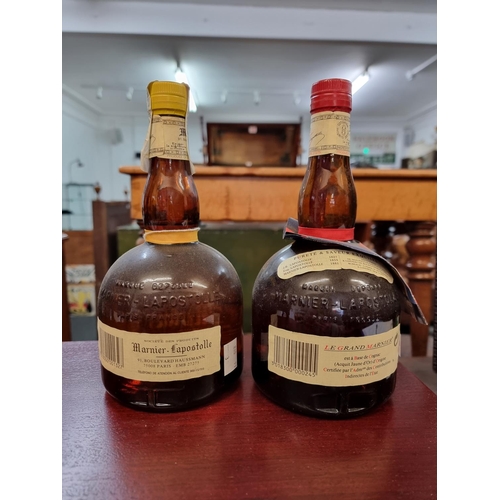 26 - Two 70cl bottles of Grand Marnier Liqueur, comprising: Cordon Jaune & Cordon Rouge. (2)... 