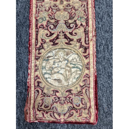 1291 - An interesting late 17th century Spanish embroidered red velvet orphrey, 101 x 22cm.... 