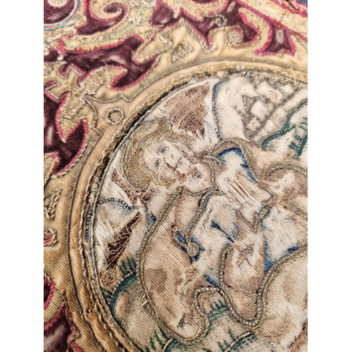 1291 - An interesting late 17th century Spanish embroidered red velvet orphrey, 101 x 22cm.... 