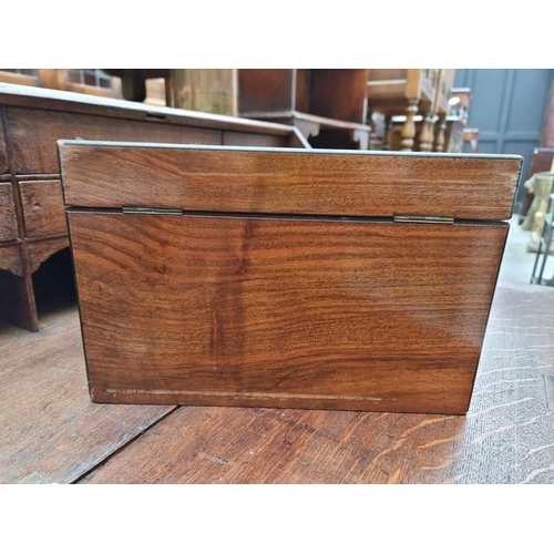 1196 - A late Victorian figured walnut work box, 34cm wide.