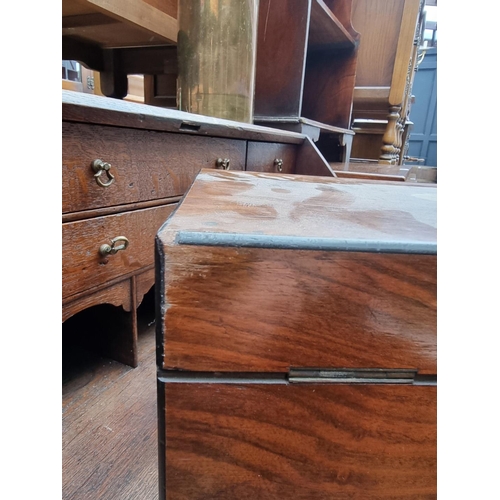 1196 - A late Victorian figured walnut work box, 34cm wide.