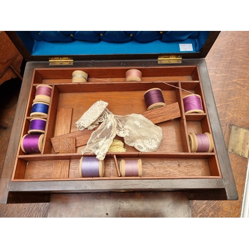 1196 - A late Victorian figured walnut work box, 34cm wide.