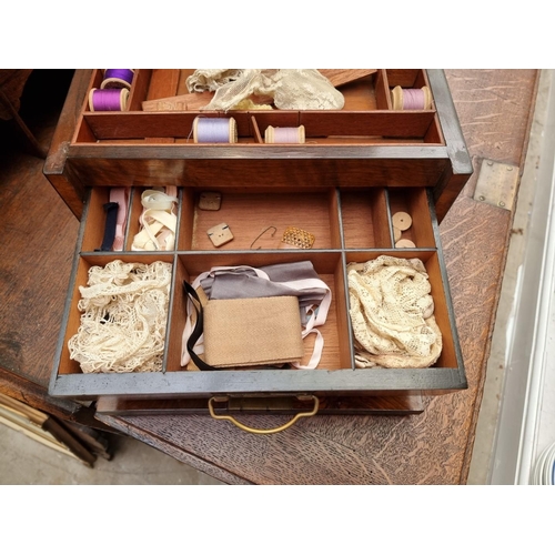 1196 - A late Victorian figured walnut work box, 34cm wide.