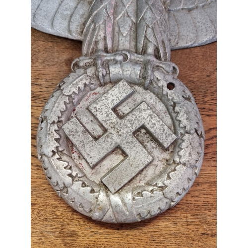 1512 - A German Third Reich aluminium State Eagle Hoheitszeichen, 68.5cm wide. (a.f.).Provenance: by repute... 