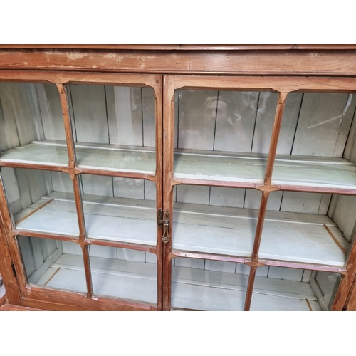 1200 - A Victorian Gothic pine bookcase, 159cm wide.