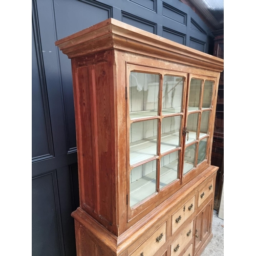 1200 - A Victorian Gothic pine bookcase, 159cm wide.