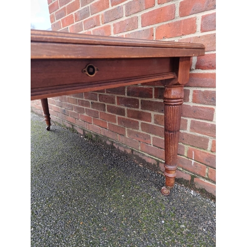 1213 - A late Victorian mahogany dining table, on reeded legs, with one leaf insertion, 177cm extended... 