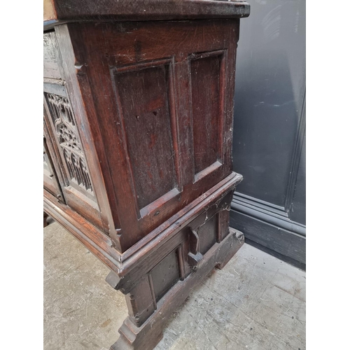 1241 - A 16th century and later oak side cabinet, with fall front and trestle supports, 91cm wide.... 