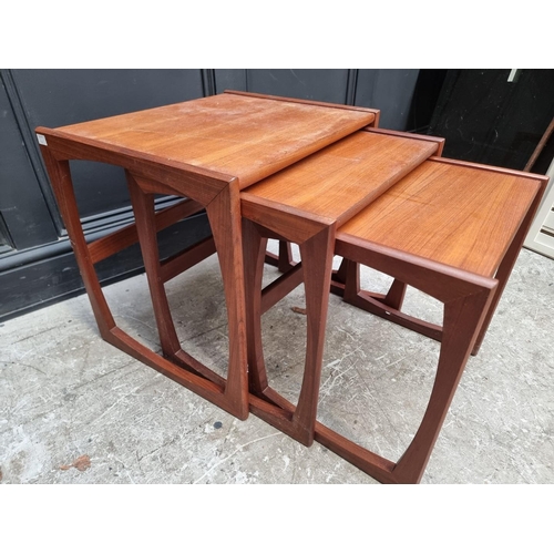 1243 - A nest of three vintage G-Plan occasional tables, largest 53.5cm wide.