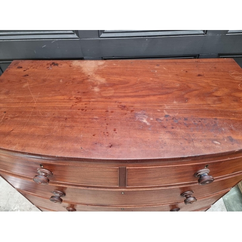 1251 - A 19th century mahogany bowfront chest of drawers, with shaped apron, 107cm wide.