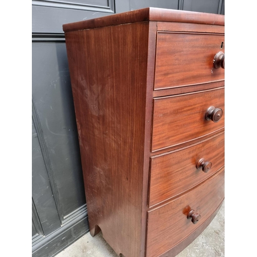 1251 - A 19th century mahogany bowfront chest of drawers, with shaped apron, 107cm wide.