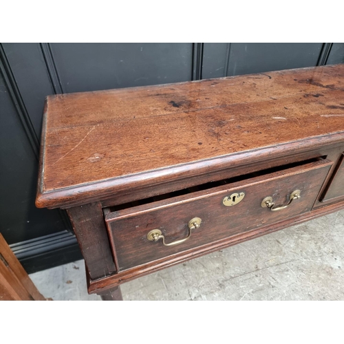 1254 - A George III oak dresser base, 190cm wide.