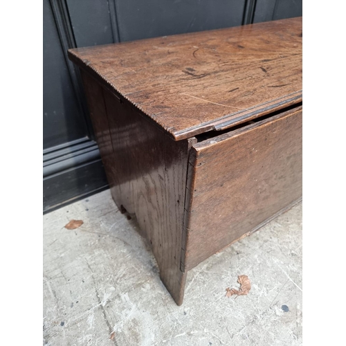 1256 - A late 17th century oak boarded coffer, 114cm wide.