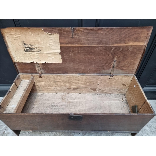 1256 - A late 17th century oak boarded coffer, 114cm wide.