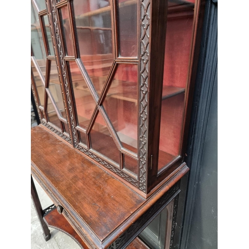 1257 - A good 19th century mahogany blindfret display cabinet, in the Chippendale style, 76.5cm wide.... 