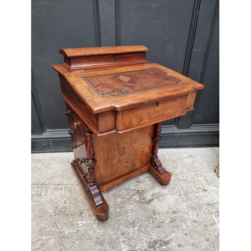 1262 - A Victorian walnut and satinwood crossbanded Davenport, 54cm wide.