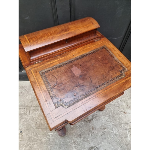 1262 - A Victorian walnut and satinwood crossbanded Davenport, 54cm wide.