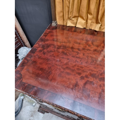 1266 - A large and impressive early 20th century carved mahogany sideboard, with original brass galler... 