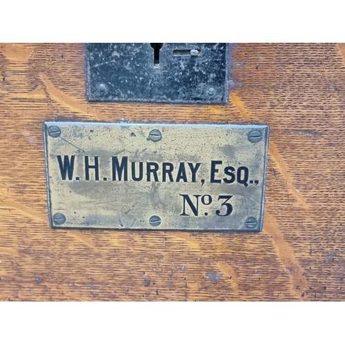 1270 - A large late Victorian oak and metal bound silver strong box, bearing brass plaque inscribed 'W.H.Mu... 