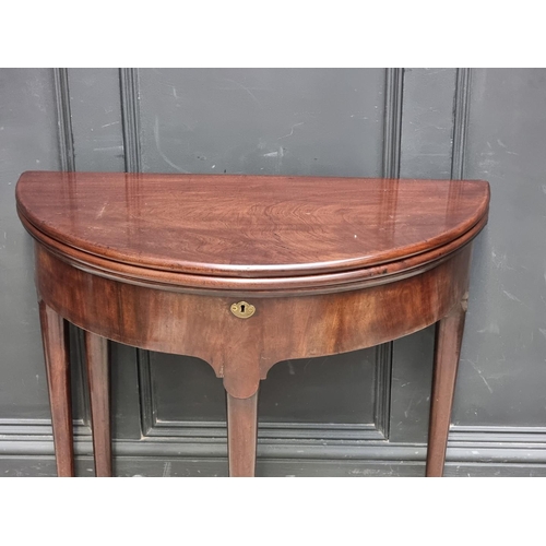 1273 - An 18th century 'red walnut' double fold-over card table, with single gateleg, 84cm wide.... 