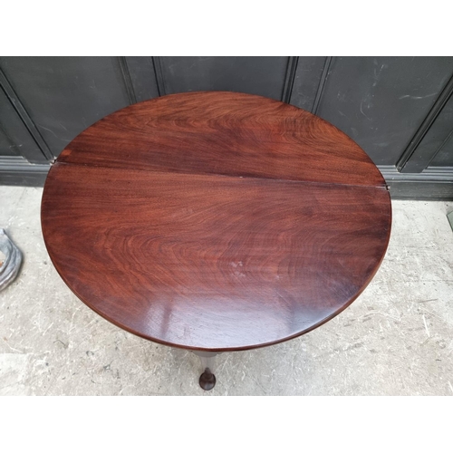 1273 - An 18th century 'red walnut' double fold-over card table, with single gateleg, 84cm wide.... 