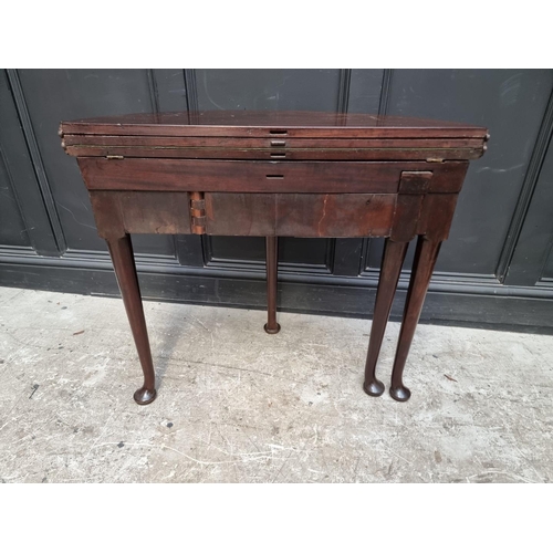 1273 - An 18th century 'red walnut' double fold-over card table, with single gateleg, 84cm wide.... 