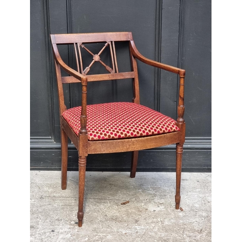 1275 - An unusual early 19th century beech elbow chair, the back with crossed arrows, possibly America... 