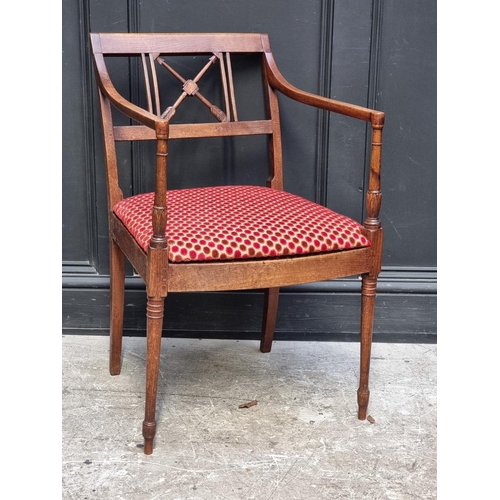 1275 - An unusual early 19th century beech elbow chair, the back with crossed arrows, possibly America... 