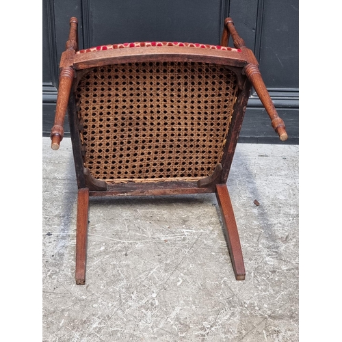 1275 - An unusual early 19th century beech elbow chair, the back with crossed arrows, possibly America... 