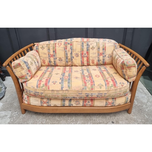 1277 - An Ercol two seater settee and matching armchair.