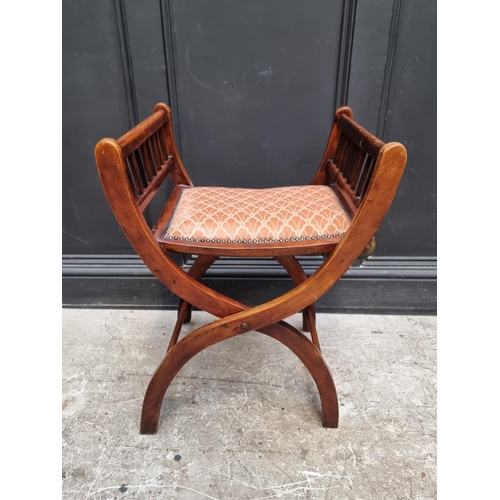 1281 - A circa 1900 beech and upholstered folding 'X' frame stool, 51cm wide.