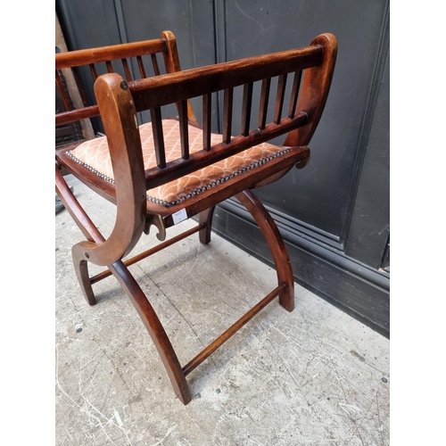 1281 - A circa 1900 beech and upholstered folding 'X' frame stool, 51cm wide.