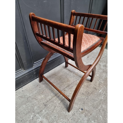 1281 - A circa 1900 beech and upholstered folding 'X' frame stool, 51cm wide.