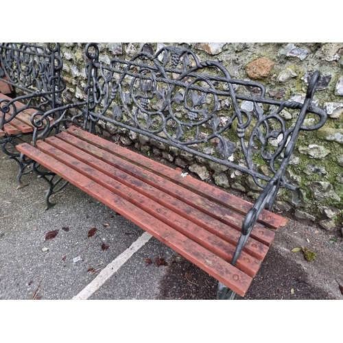 1291 - A pair of steel or cast iron garden benches, total width 122cm. (2)