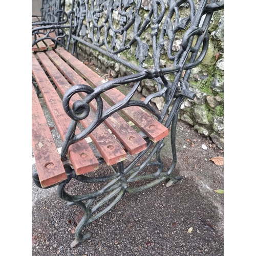 1291 - A pair of steel or cast iron garden benches, total width 122cm. (2)