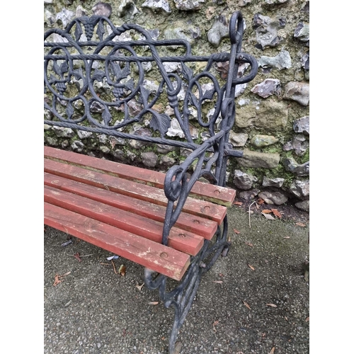 1291 - A pair of steel or cast iron garden benches, total width 122cm. (2)