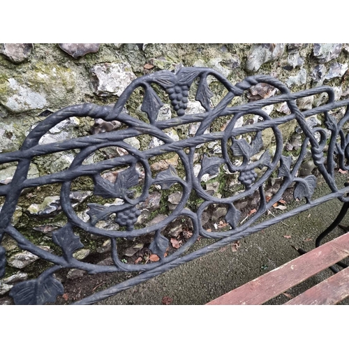 1291 - A pair of steel or cast iron garden benches, total width 122cm. (2)