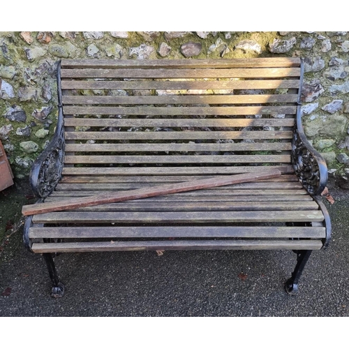 1292 - An antique cast iron garden bench, 106.5cm wide.