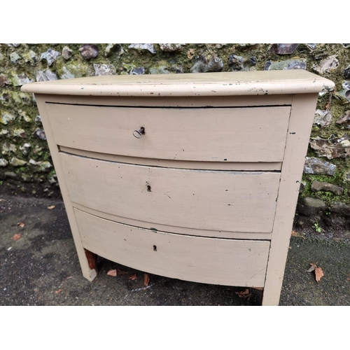 1294 - A continental cream painted pine chest of drawers, 77cm wide.